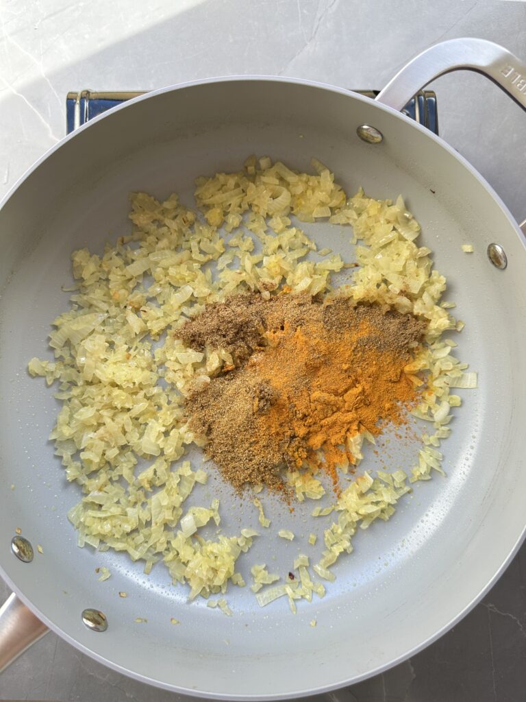 step 2 of making the chickpea curry, add the spices