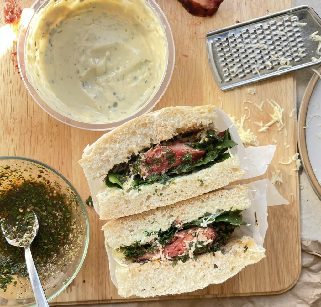 Lions mane steak in ciabatta with garlic mayo, spinach and chimichurri