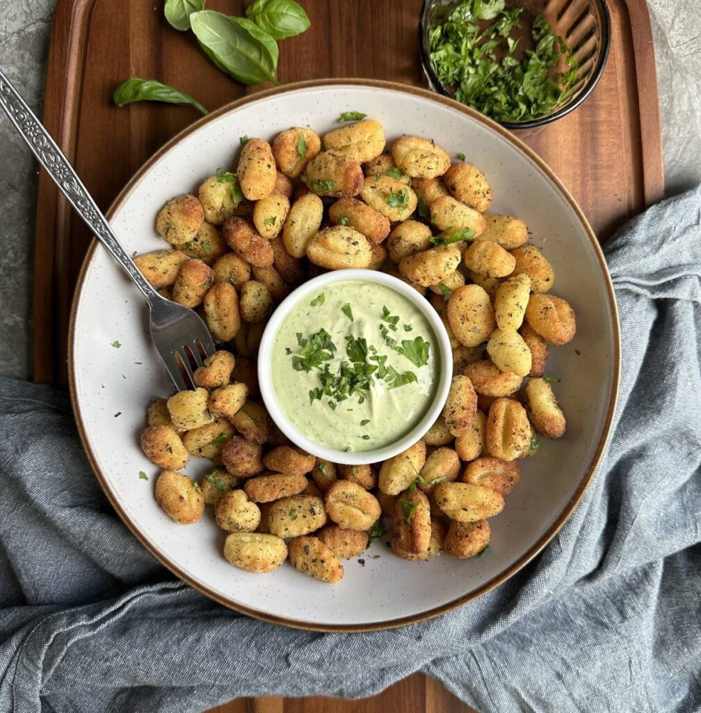 Crispy air fried gnocchi coated with Italian seasoning. served with a vegan basil mayo dip