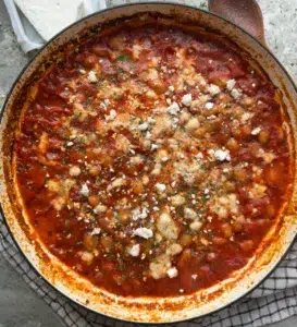 Giant butter beans roasted in a greek style tomato sauce topped with vegan feta and oregano
