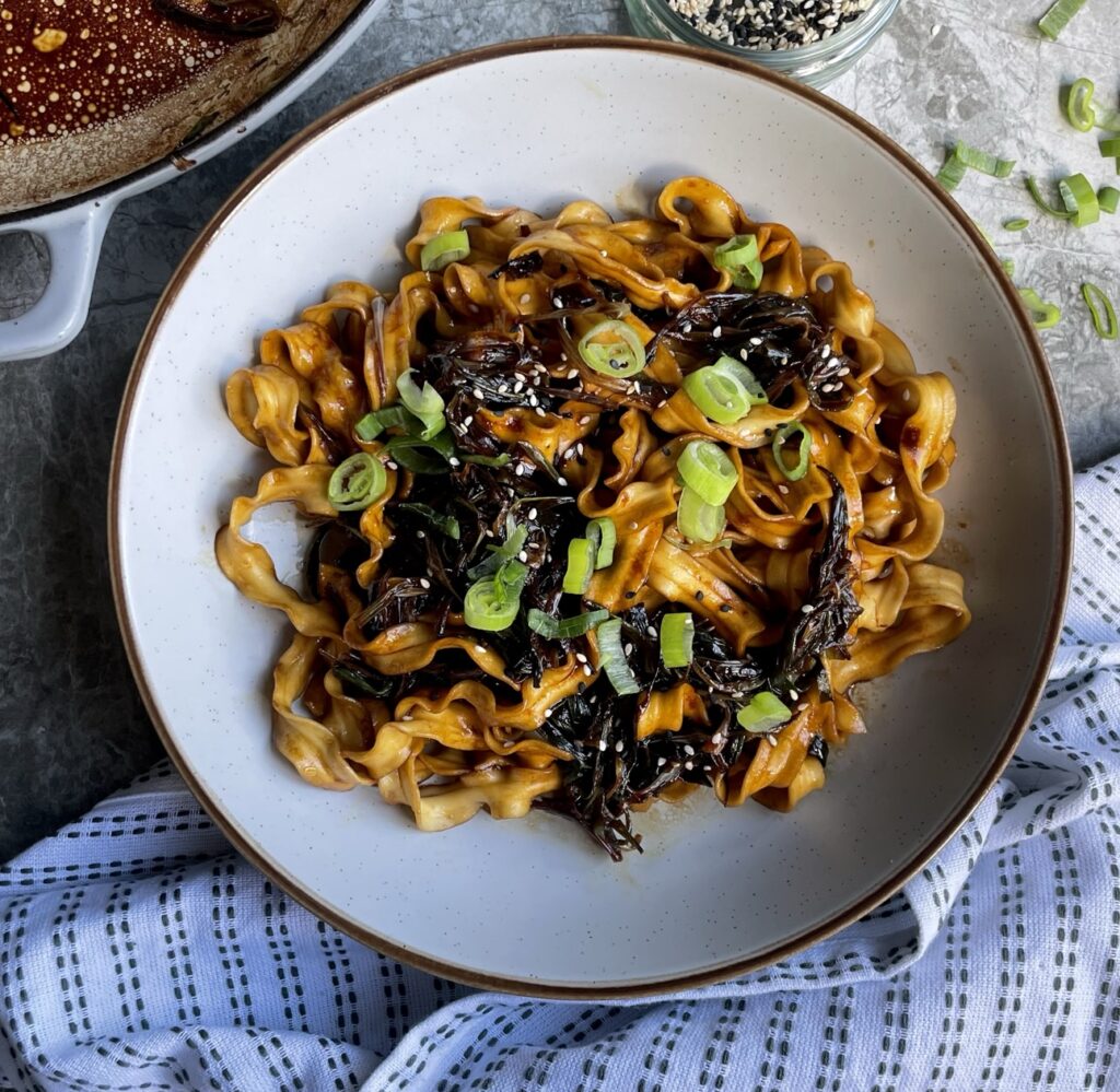 Flat thick taiwanese style noodles with caramelised spring onions and soy sauce