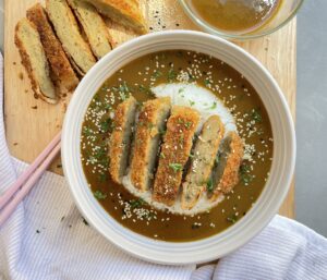 Golden, crispy bread crumbed seitan cutlet with a rich, sweet Japanese curry sauce
