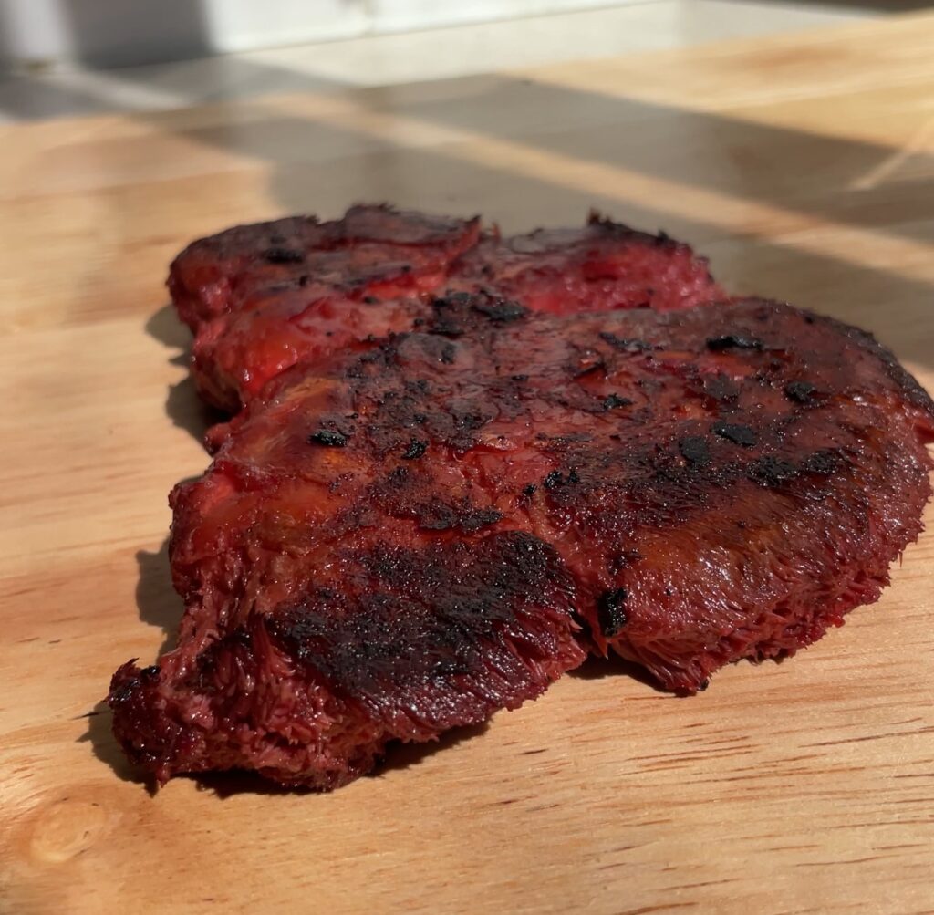 a red mushroom steak that looks like real beef