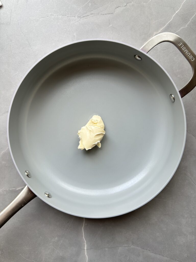 step four of cooking courgette orzo, melt the butter