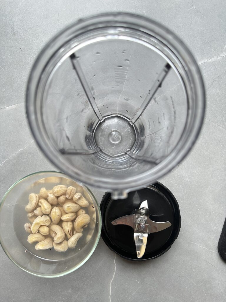 step nine of cooking courgette orzo, blend the water and cashews