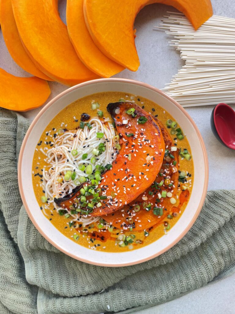 Creamy ramen broth with noodles, chilli oil and topped with baked pumpkin